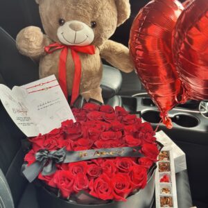 Box 50 Rosas + Peluche y globos